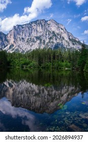 Beautiful view with the mountain in the background and with the reflection in the foreground