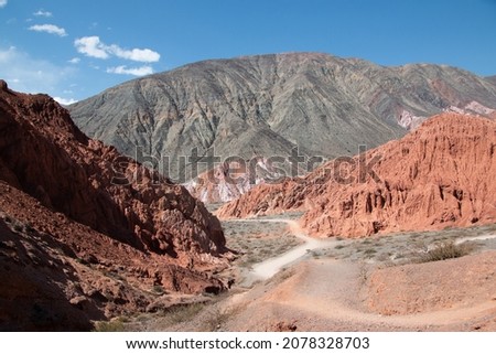 A beautiful view of mountains and cliffs in Purmamarca,  Argentina