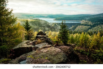beautiful view of the nature and landscape in the ore mountains in the sunrise with sun and fog damn flaje and pukla skala - Shutterstock ID 2062600712
