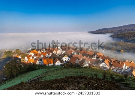  Beautiful view near town of Schieder-Schwalenberg in the state of North Rhine-Westphalia in Germany, landscape with fog