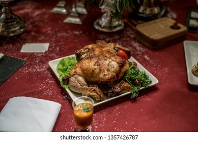 Beautiful view and objects. Beautiful background and view of delicious roasted chicken, meat in a restaurant, cafe, bar, in an expensive and chic interior.