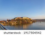 A beautiful view of the old Austro-Hungarian Petrovaradin fortress and the Danube river in Novi Sad from the Varadin bridge