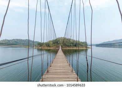beautiful view on lake and mountain on wooden bridge