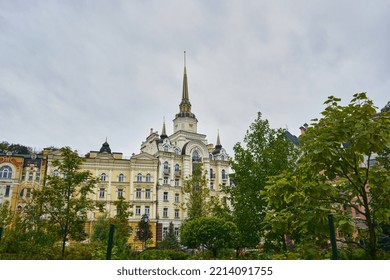 A Beautiful View On Yellow Building With A Dome Roof With Spire In Vozdvyzhenka, Podil District, Kyiv, Ukraine. Space For Text. 