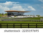 Beautiful view of one of the most important Curragh racecourse under blue sky with fluffy clouds, Newbridge, Ireland