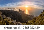 Beautiful view over the mountains and atlantic at sunset from Table Mountain in Cape Town in South Africa