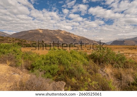 a beautiful view of the Peruvian mountains with the dramatic skies of Peru