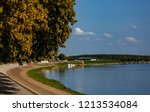 Beautiful view of river Sava in Slavonski Brod. Fishermen standing by the river and fishing fish.