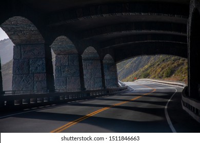 Beautiful View Of Road Passing Tunnel With Arches, Big Sur, California, USA