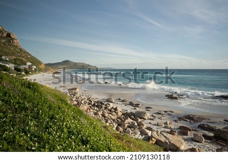 A beautiful view of the rocky beach in the Misty Cliffs Cape Town, South Africa