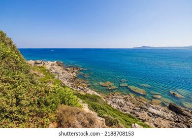 Beautiful view of rocky coast on turquoise water background in Mediterranean sea. Greece.