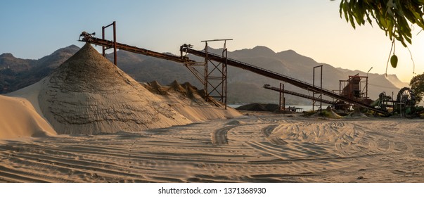 Beautiful View Of Sand Mine And Mountain Background.