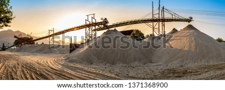 beautiful view of sand mine and mountain background.