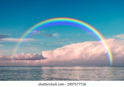 Beautiful View Of Sea With Clouds And Rainbow In Sky On Summer Day