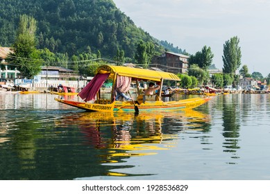  Beautiful view of Shikara boat ride on dal lake with houseboats and mountain background at Srinagar taking on 21 JULY 2018, Kashmir, India.