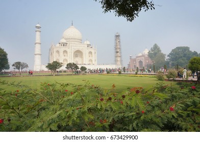 Beautiful view shot from the left side of Royal Gate Entry of Taj Mahal in the misty morning weather. - Powered by Shutterstock