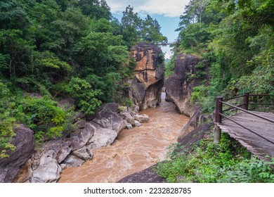 Beautiful view from small iron bridge over Op Luang Canyon and fast-flowing river in Op Luang National Park, Chiang Mai, Thailand. - Shutterstock ID 2232828785