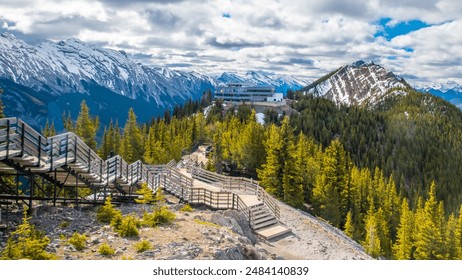 Beautiful view of snow capped mountains, banff gondola in Banff National Park, Alberta, Canada - Powered by Shutterstock