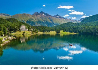 Beautiful view at St.Moritz lake with clouds reflected in water