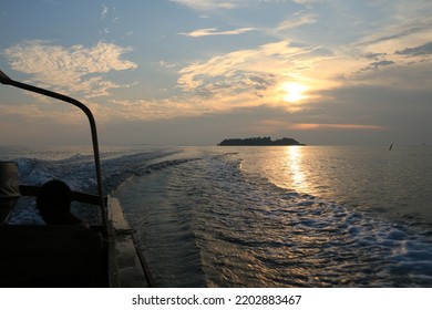 Beautiful View At Sunset On The Boat Ride Across The Island