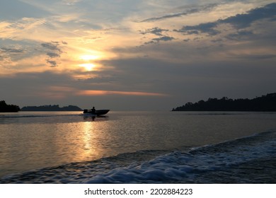 Beautiful View At Sunset On The Boat Ride Across The Island