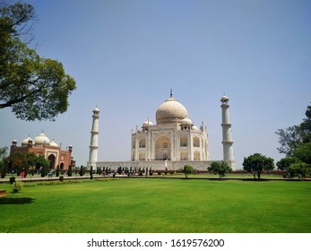 Beautiful View Of Tak Mahal In India With Garden View. Beautiful Marble Made Taj Mahal With Copy Space. The Wonder Of India In Agra.