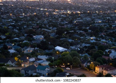 Beautiful View Of A Town In Auckland, New Zealand. Cloud Sunset And Town, View From Mt. Eden.