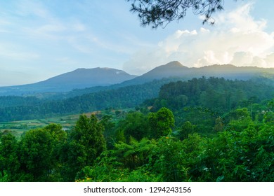 a beautiful view of twin mountain Gede and Pangrango in Puncak Bogor, Indonesia. - Shutterstock ID 1294243156