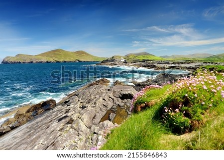 Beautiful view of Valentia Island Lighthouse at Cromwell Point. Locations worth visiting on the Wild Atlantic Way. Scenic Irish countyside on sunny summer day, County Kerry, Ireland