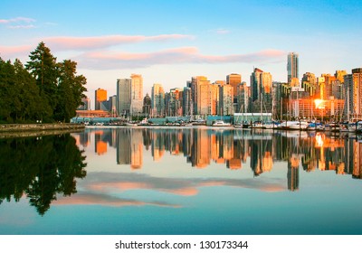 Beautiful view of Vancouver skyline with Stanley Park at sunset, British Columbia, Canada
