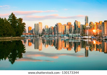 Beautiful view of Vancouver skyline with Stanley Park at sunset, British Columbia, Canada