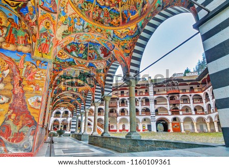 Beautiful view of the vibrant decoration of the Orthodox Rila Monastery, a famous tourist attraction and cultural heritage monument in the Rila Nature Park mountains in Bulgaria