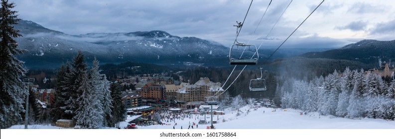 Beautiful View Of Whistler Village During A Cloudy Winter Sunset. Touristic Ski Town In British Columbia, Canada.