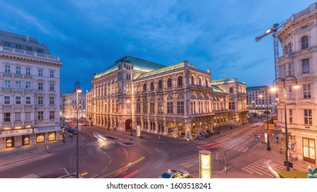 Beautiful View Of Wiener Staatsoper (Vienna State Opera) Aerial Day To Night Transition Timelapse In Vienna, Austria. Illuminated Historic Buildings And Traffic On Streets