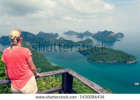 Beautiful view with a woman, island in Thailand. 