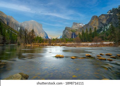 beautiful view in Yosemite valley with half dome and el capitan in winter from merced river