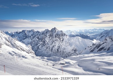 The beautiful view from the Zugspitze summit on the Alps on a frosty winter day. Bavarian Alps, Germany. Zugspitze Ski Resort. Winter in the Bavarian Alps.  - Powered by Shutterstock