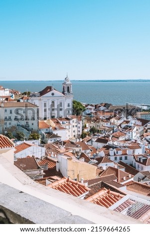 Beautiful viewpoint in the city of Lisbon with the city and the sea in the background