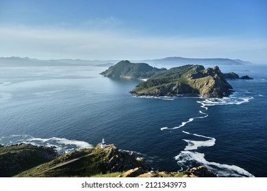 Beautiful views with Da Porta lighthouse and San Martiño Island in Islas Cies, Atlantic Islands of Galicia National Park, Pontevedra, Spain - Shutterstock ID 2121343973