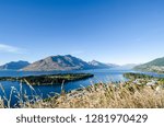 Beautiful views of mountain range and lake across a town