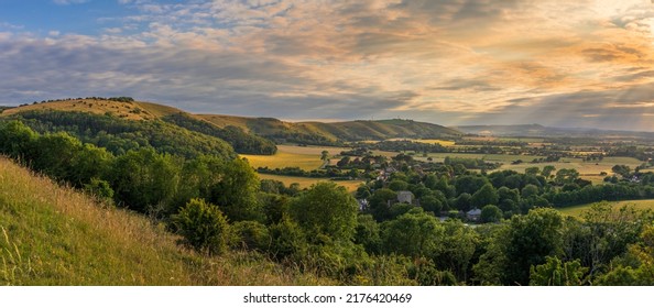 Beautiful views west over the village of Poynings from Devils Dyke to Chanctonbury ring on the south downs in west Sussex south east England UK - Shutterstock ID 2176420469