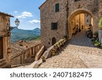 The beautiful village of Castelnuovo Val di Cecina on a sunny summer morning. Province of Pisa, Tuscany, Italy. 