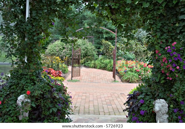 Beautiful Vine Covered Arbor Frames Path Stock Photo (Edit Now) 5726923