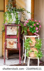 Beautiful Vintage Table With Blooming Flowers In The Garden, Canada