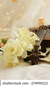 Beautiful violin with flowers