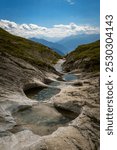 A beautiful walk on alp mora in Switzerland, Natural pools created by the glacier, Bargis, Hike from Trin