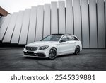 Beautiful wallpaper of a white special breed Powerful V8 stationwagon car