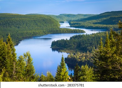 The beautiful Wapizagonke Lake at sunset viewed from the lookout Le passage, La Mauricie National Park, Quebec, Canada