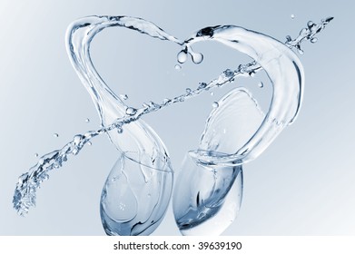 beautiful  water splash as heart with arrow - Shutterstock ID 39639190