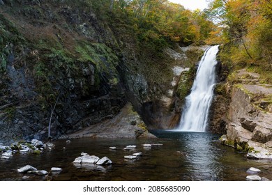 Beautiful waterfall in the forest at autumn season